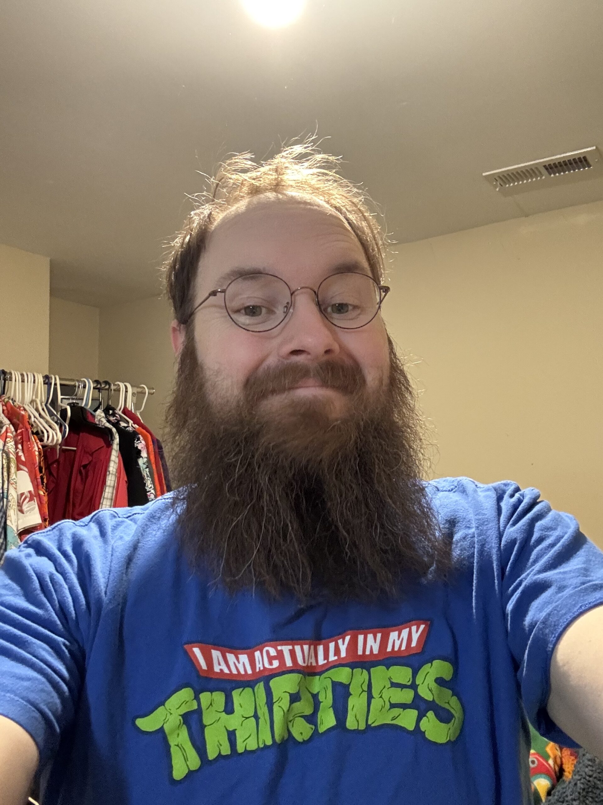 A selfie of Jonathan, smiling to the camera.